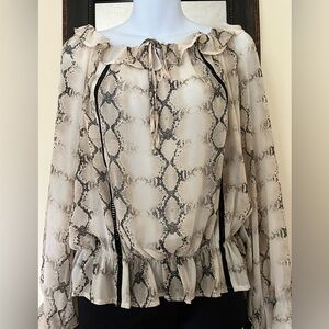 XOXO Beautiful snakeskin pattern blouse.